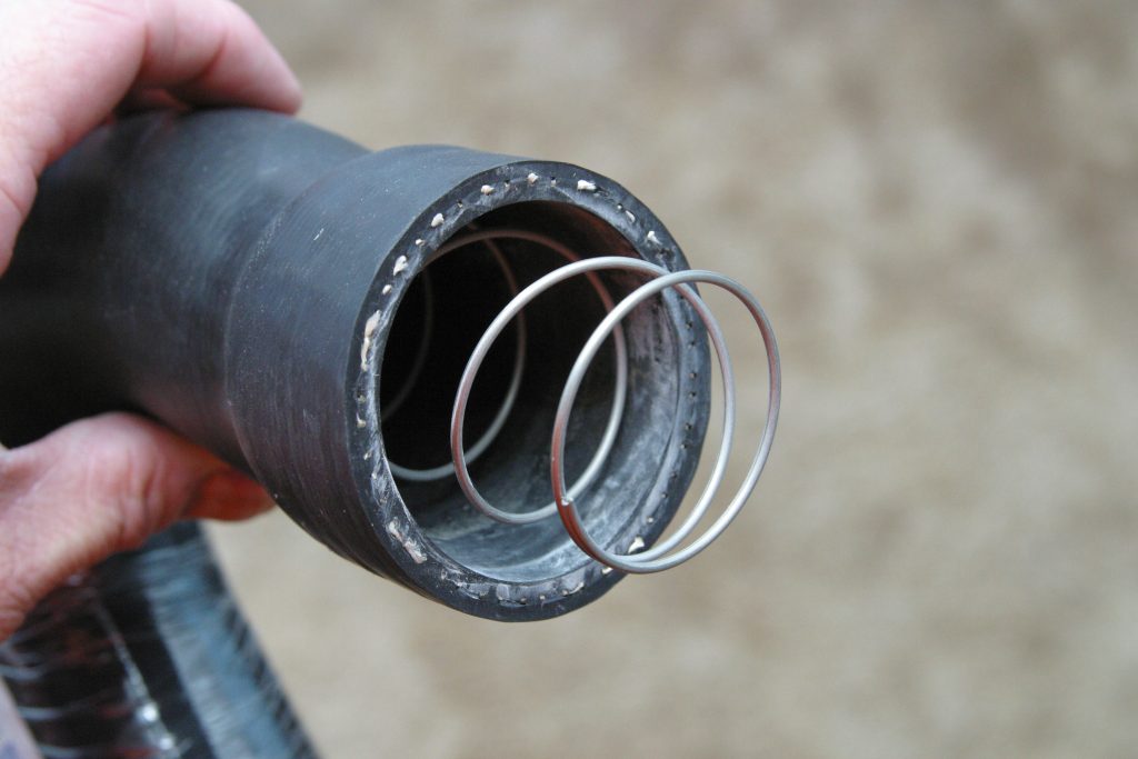 anti collapse spring inside a radiator hose