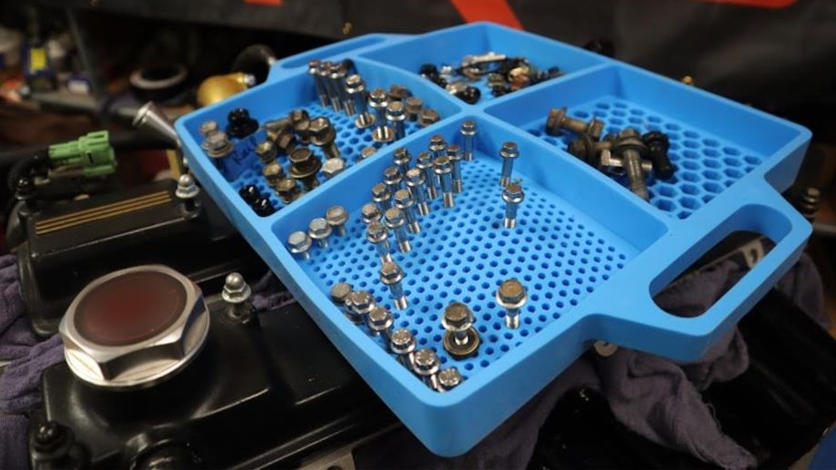 boltster bolt bit and hardware organizer in use on valve cover