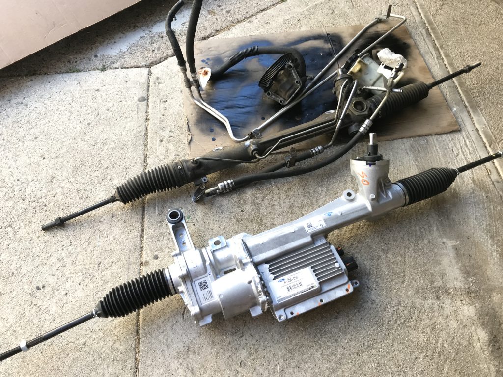 side-by-side comparison of electric and hydraulic steering rack for mustang