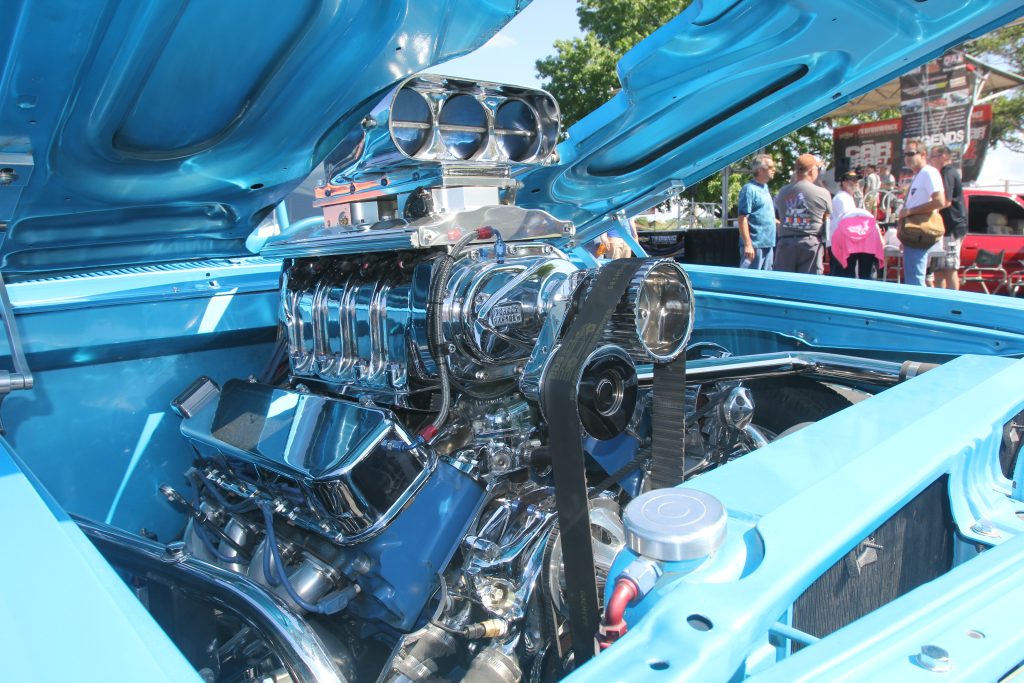 roots supercharger on a big block chevy v8 in a classic muscle car