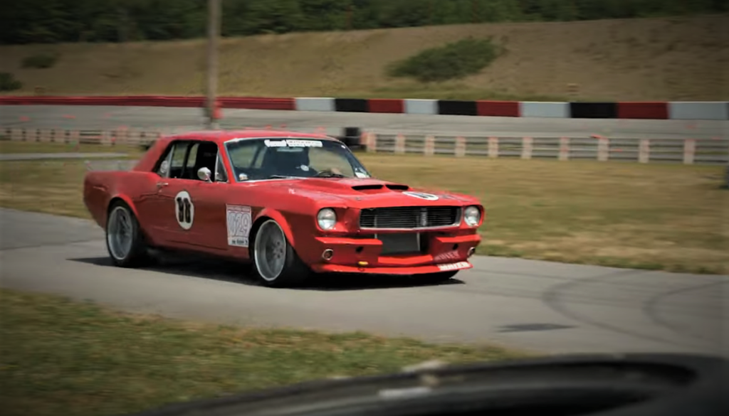 Vintage Ford Mustang on Autocross Course track