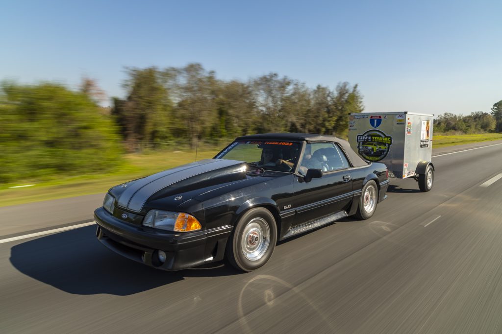 fox body ford mustang pulling a trailer during sick week