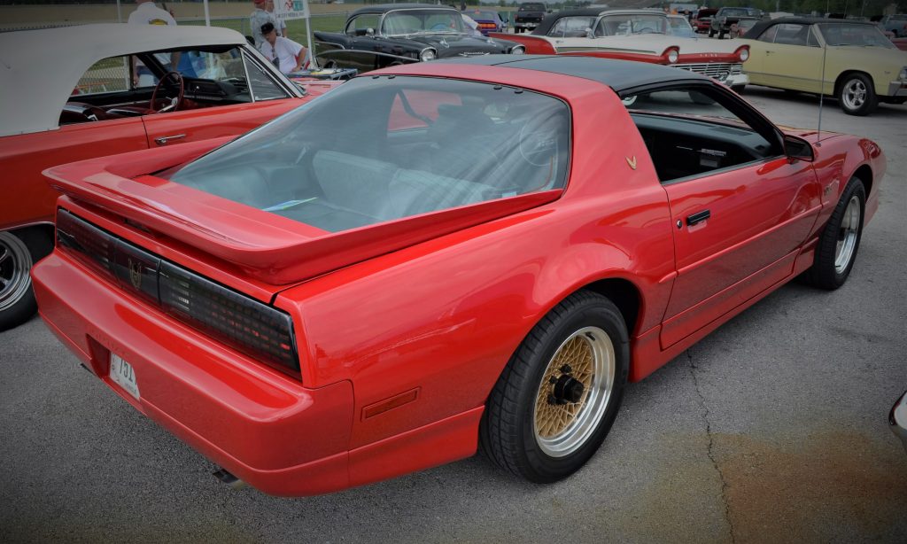 third gen red pontiac firebird coupe at super summit 2015