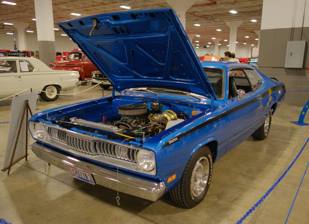 blue 1971 plymouth duster on display