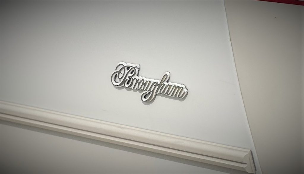 Close up of a Brougham Emblem on a 1988 Cadillac