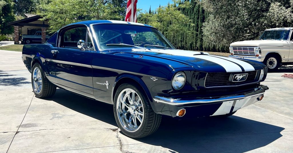 Front quarter view of a 1966 Ford Mustang GT Fastback with Custom Wheels