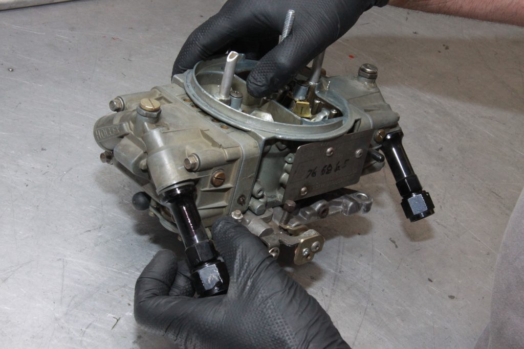 removing fuel fittings from a holley carburetor