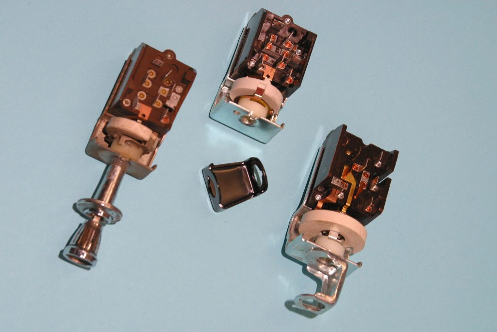 a collection of vintage headlight switches