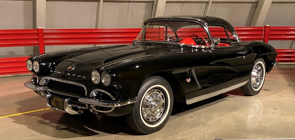black 1962 chevy corvette on display at museum