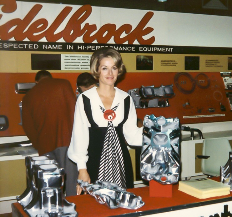 vintage photo of Nancy Edelbrock at automotive trade show display