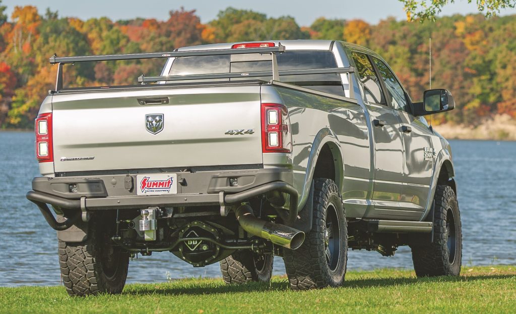 rear view of a 2018 Ram 2500 truck parked on grass near lake