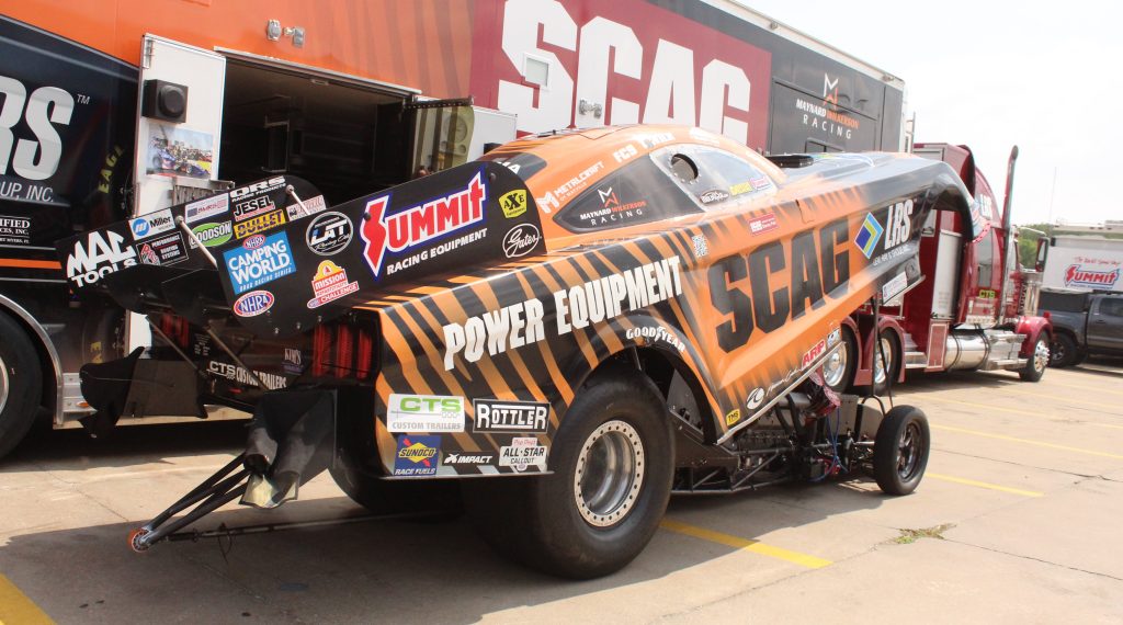 tim wilkerson funny car on display at NHRA event at Summit Racing