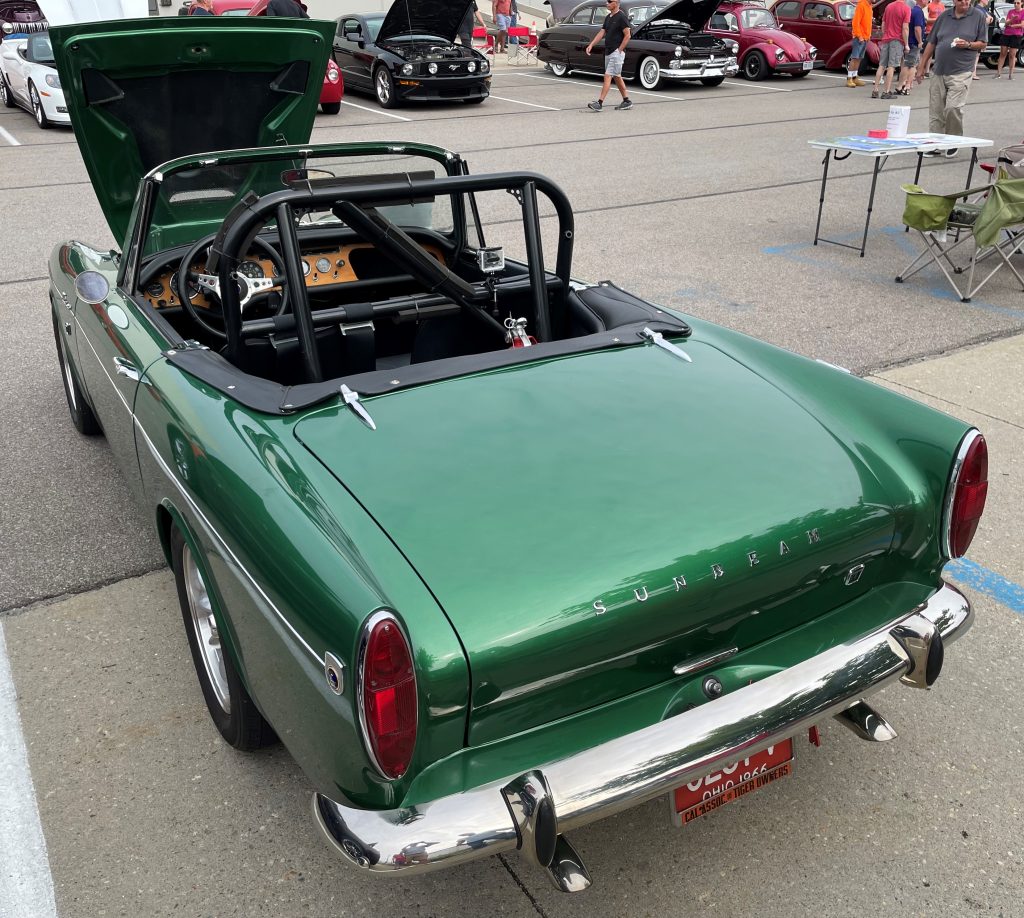 rear view of a 1966 sunbeam tiger with roll cage