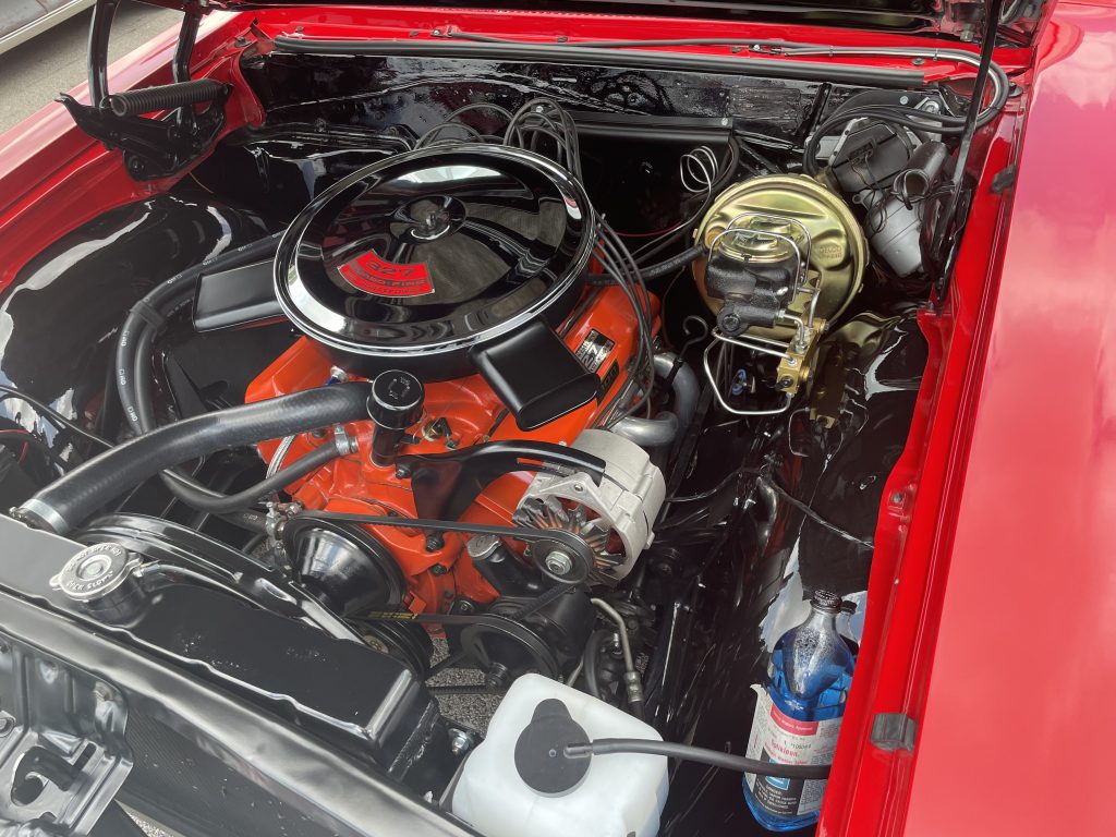 327 300 turbo fire chevy sbc v8 engine in an old muscle car