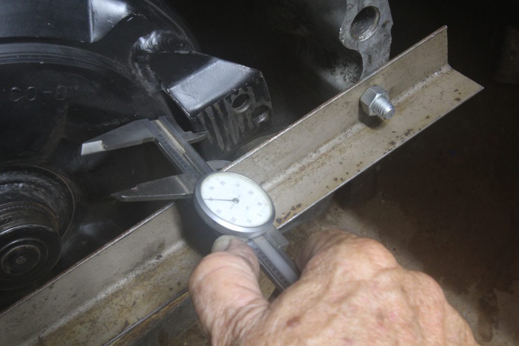 measuring torque converter clearance with straightedge and dial gauge