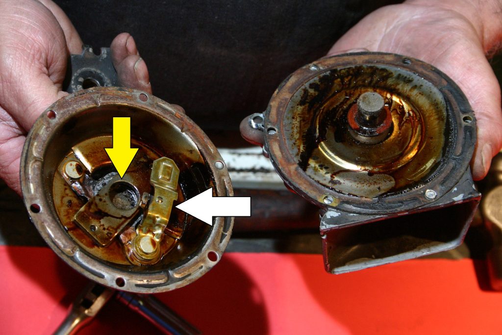 inside a disassembled vintage vehicle horn