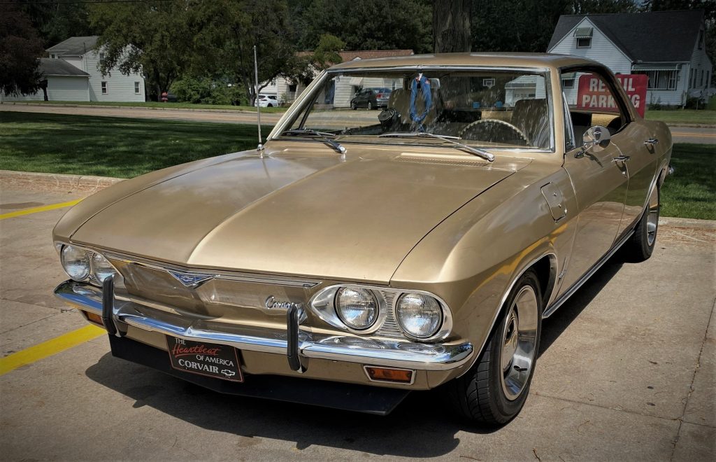 gold 1966 corvair sedan, front quarter