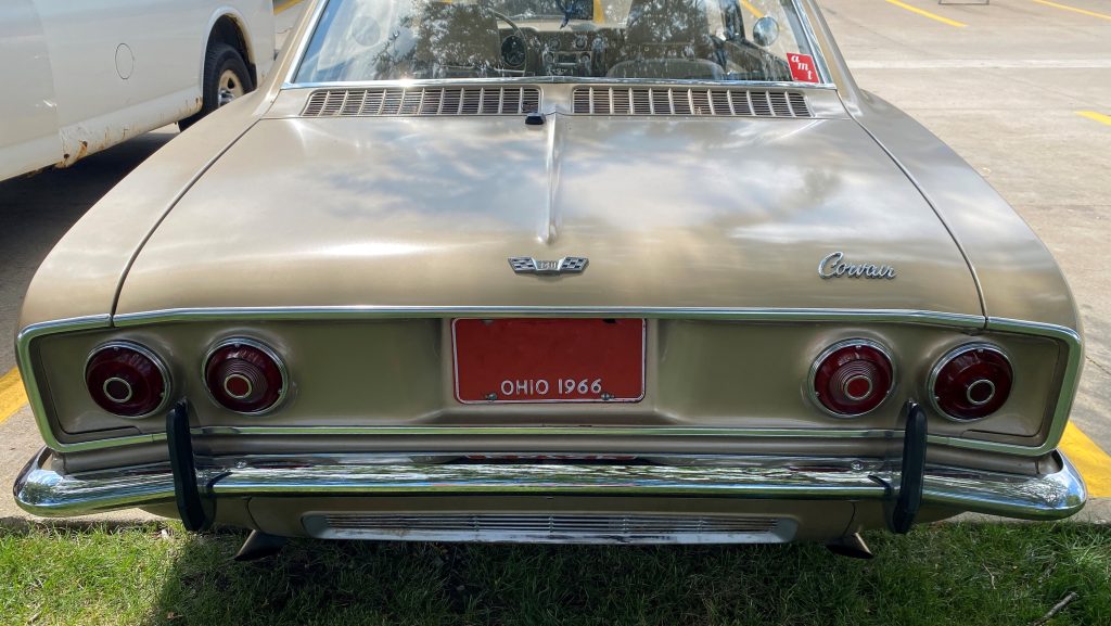 rear bumper view of a 1966 chevy corvair sedan