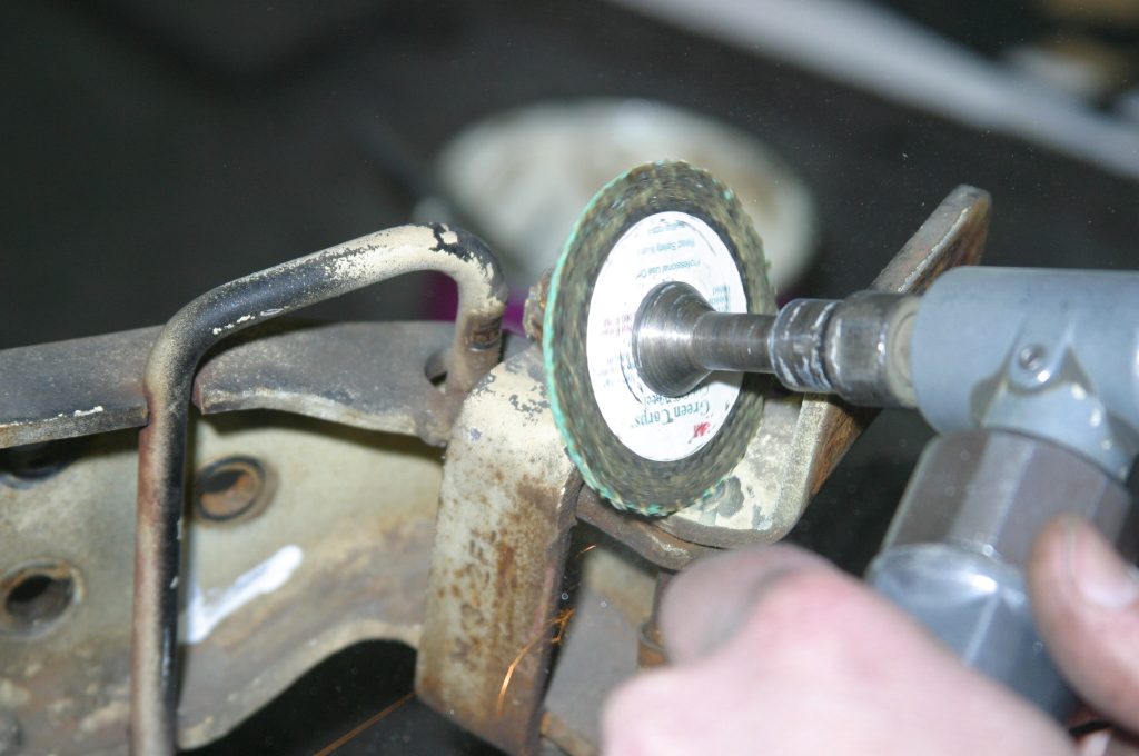 cutting hinge pin tip off car door