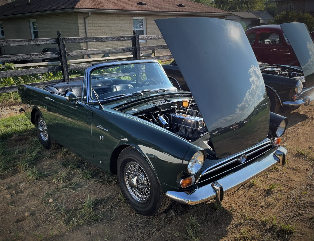 passenger side view of a sunbeam alpine coupe