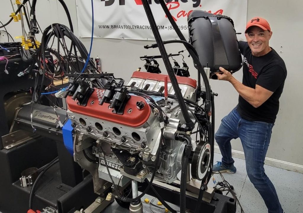 Richard holdener with big LS3 intake test in engine dyno room