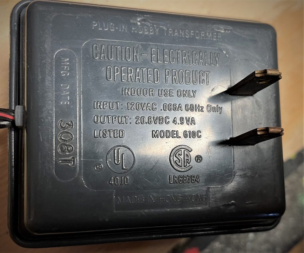 back of a slot car AC adapter