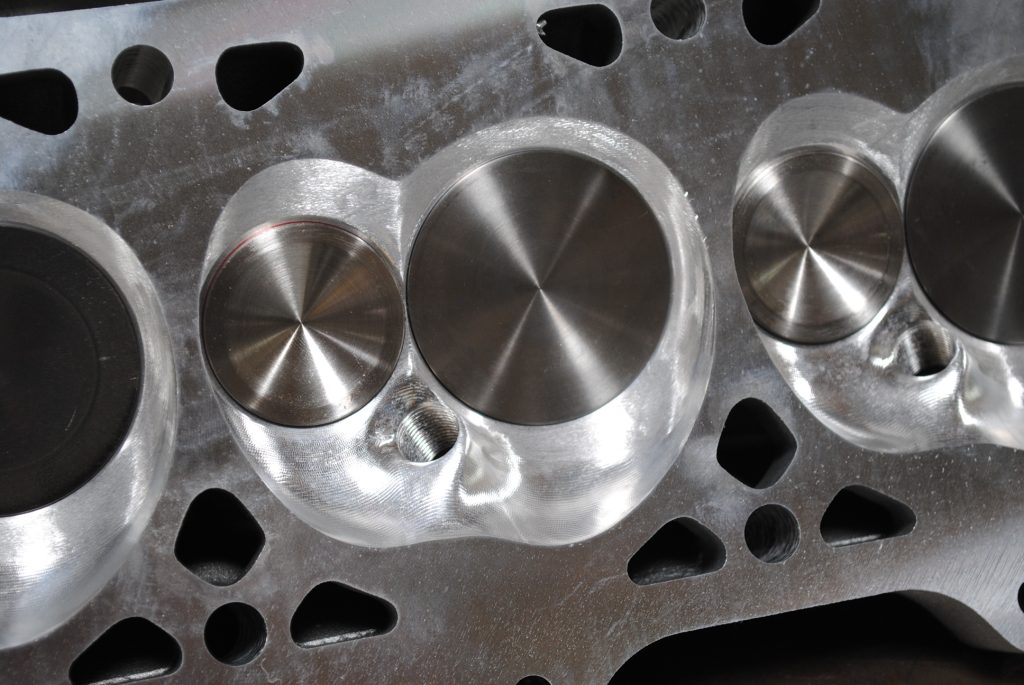 close up of combustion chamber on an ls engine cylinder head