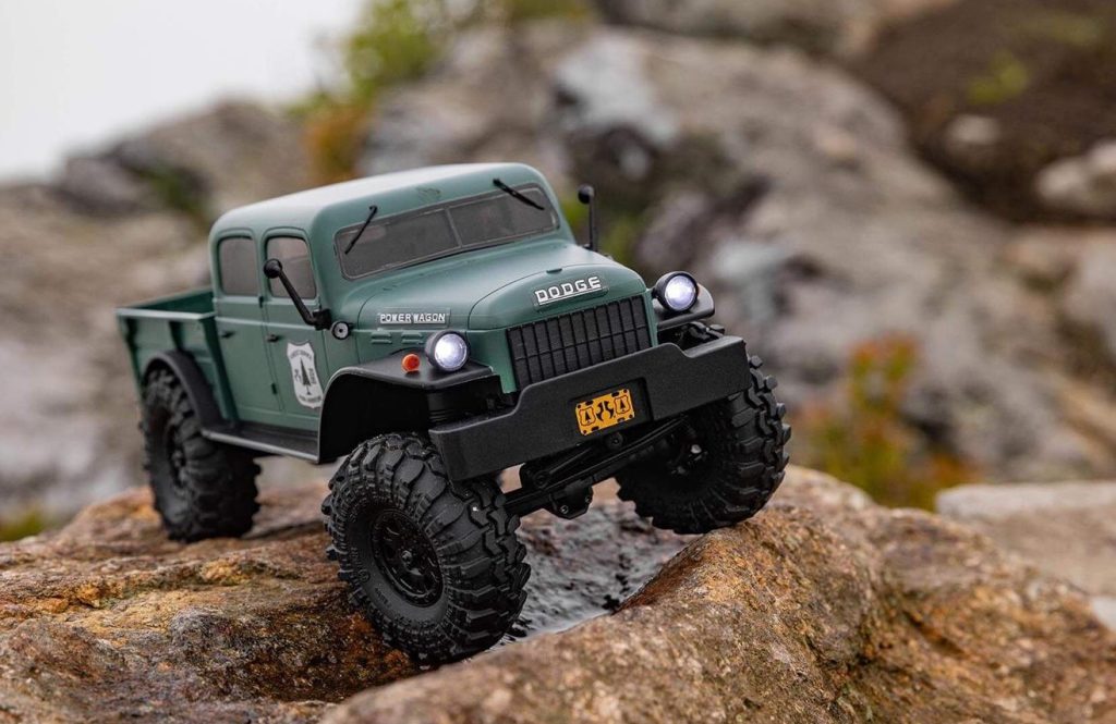 axial power wagon rc truck on a rock