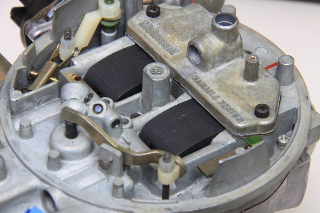 close up of top of a Ford Variable Venturi Carburetor