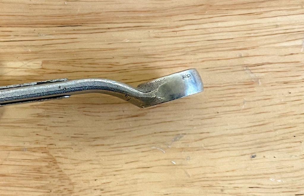 close up of the head of a box end wrench