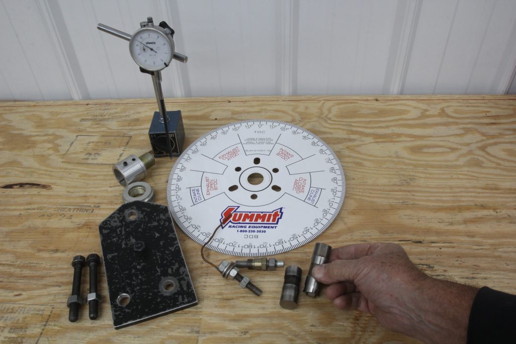 camshaft degree wheel and tools on a table