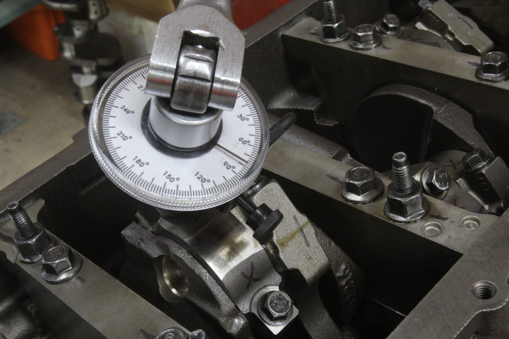 using a torque angle gauge on connecting rod bolt