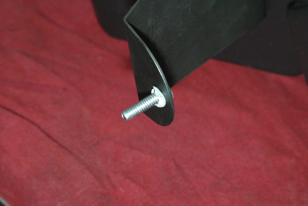 close up of threaded bolt on a bracket