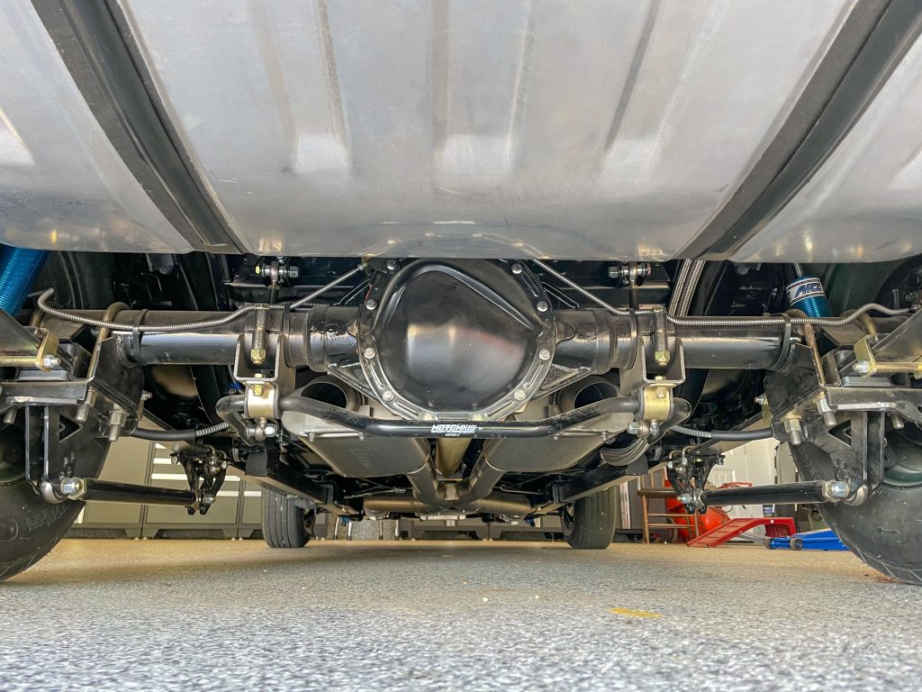 rear view of axle under a vintage muscle car