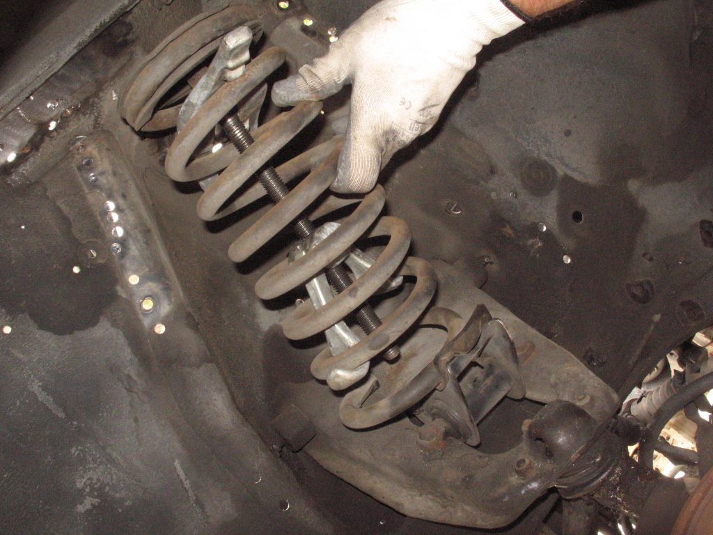 removing coil spring from a vintage ford mustang