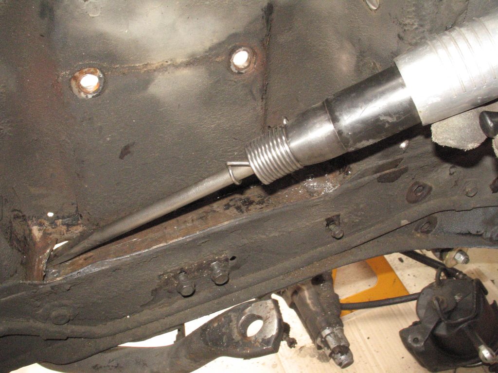 using an air chisel to remove mustang shock tower
