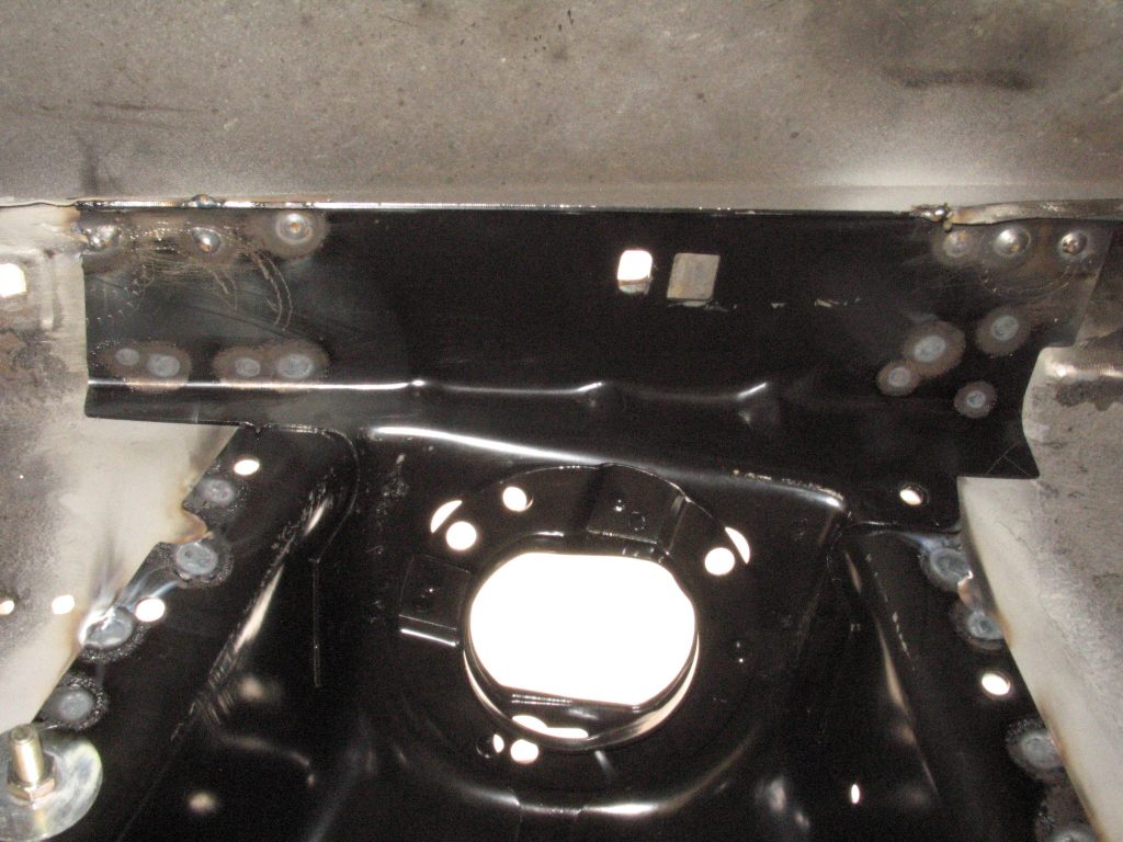 close up of welds on a new ford mustang shock tower