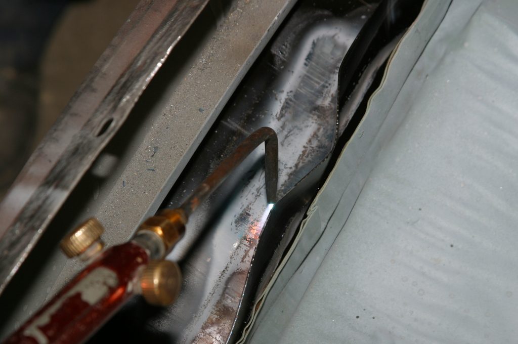 using a torch to fix warped metal