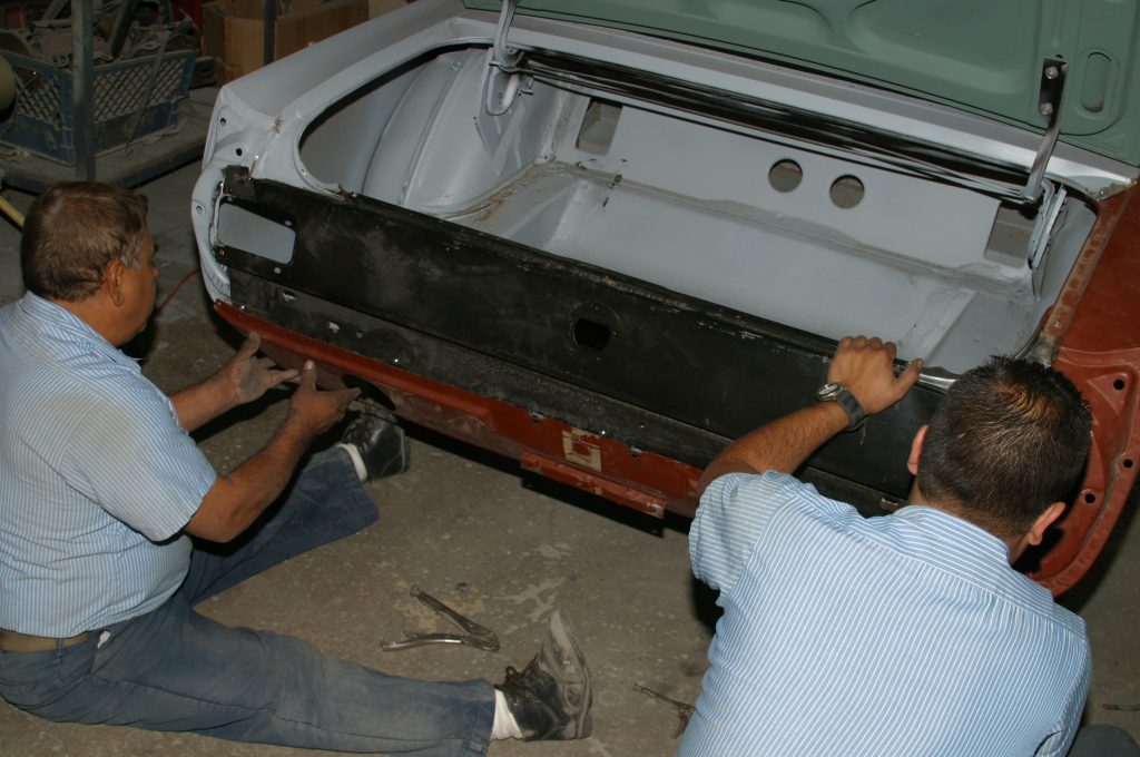 fitting rear tail panel into an old mustang