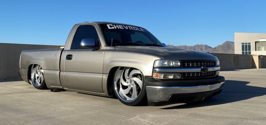 lowered chevy silverado OBS truck with custom wheels, front