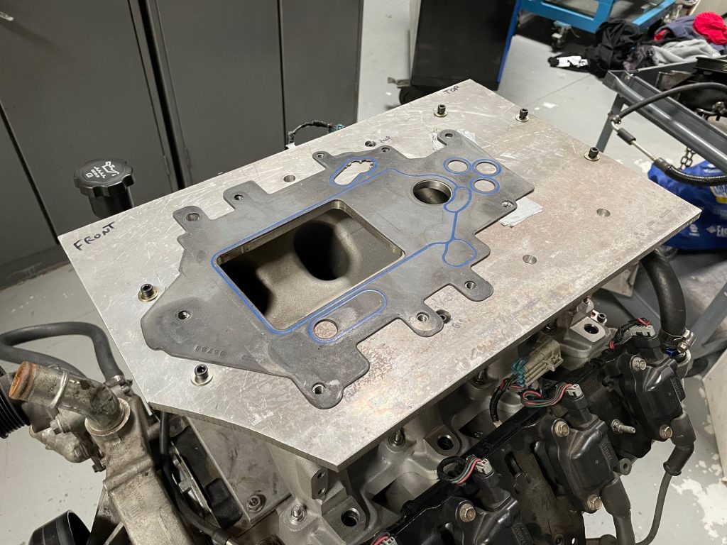 adapter plate template on an intake manifold