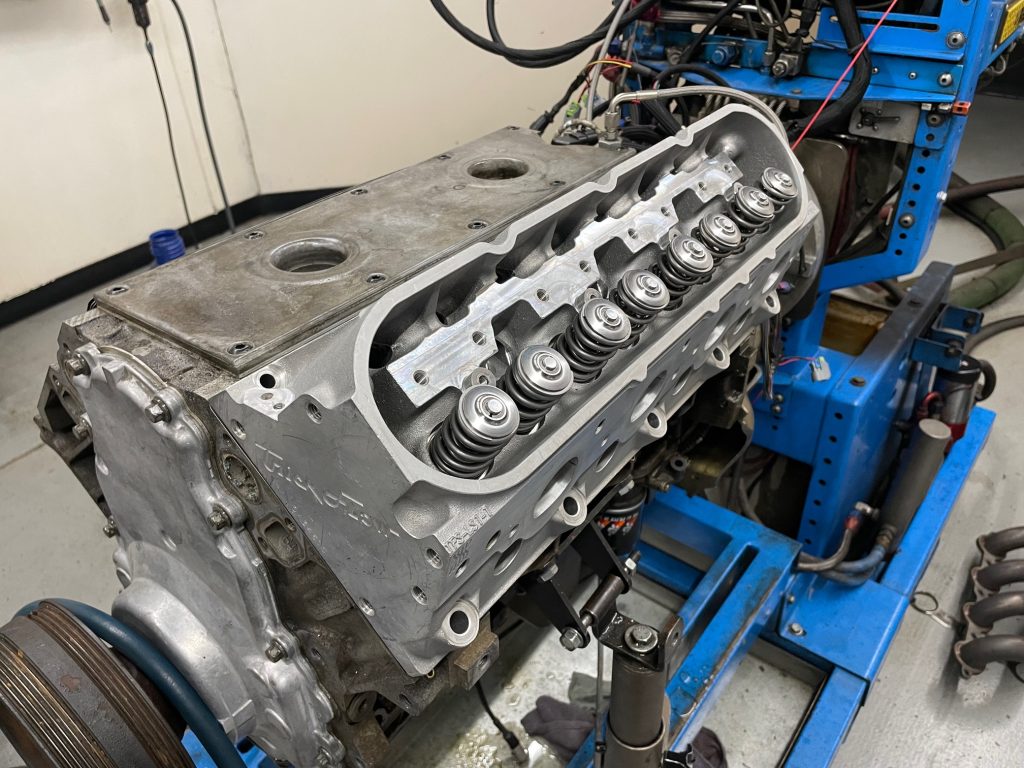 trick flow cylinder head on an engine in a dyno room