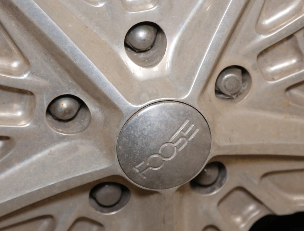 close up of lug nuts on a custom foose wheel