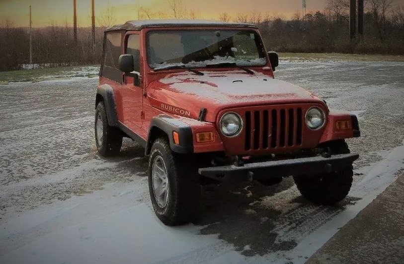 Jeep tj wrangler Rubicon In Snowy parking lot