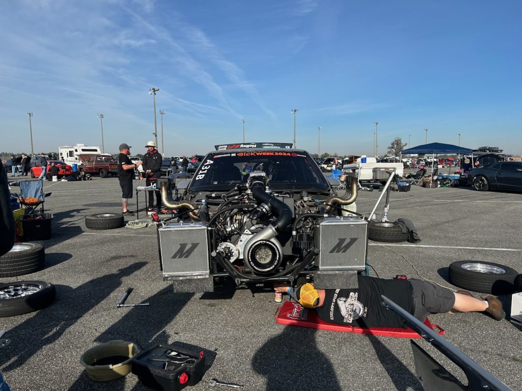 front view of a twin turbocharged drag race car