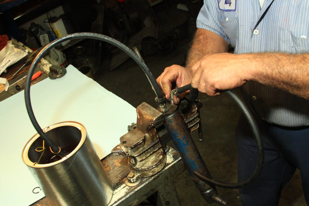 pumping fluid into a power steering cylinder