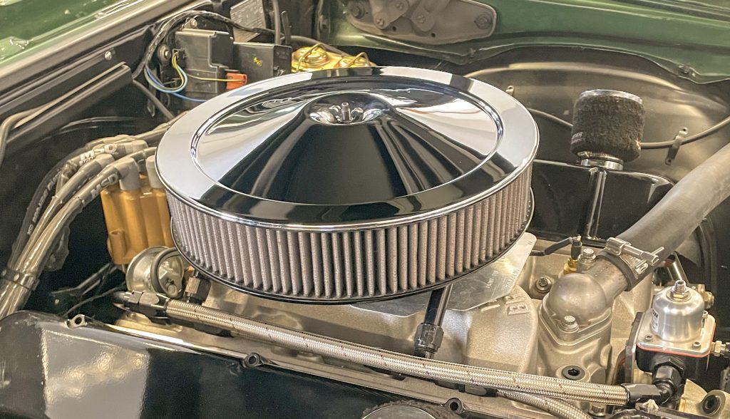 chrome air cleaner in a classic muscle car
