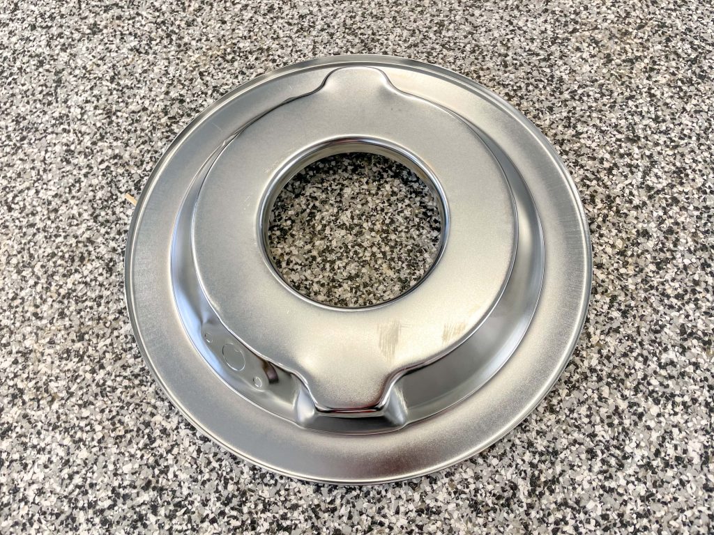 a dropped air cleaner base in bare steel