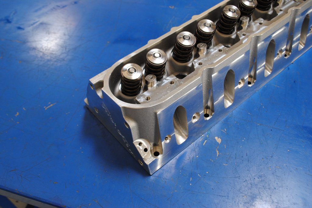 trick flow cylinder head on a table