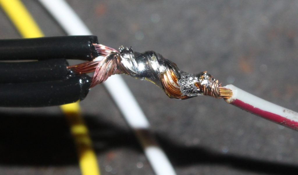a soldered wire splice joint
